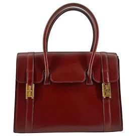 Bolso Vintage Hermès Drag 27 Circa 1970 en Cuero Box Rojo, Forro de Piel de Cabra Roja, Herrajes Bañados en Oro — Pieza Peritada