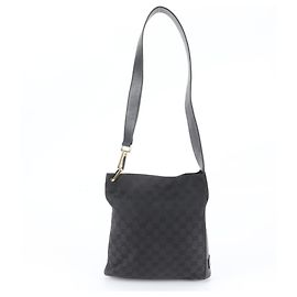 Bolsa de Ombro Gucci em Lona GG e Couro