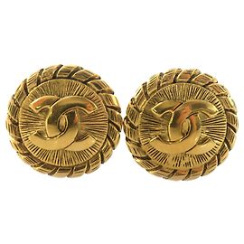 Brincos de pressão redondos Sunburst Chanel Gold CC banhados a ouro