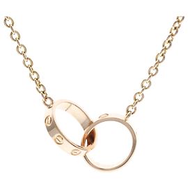 Collana con pendente Cartier Baby Love in oro rosa