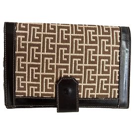Pierre Balmain Pochette en toile monogramme et cuir marron