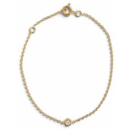 Bracciale con charm Christian Dior in oro giallo 18K e diamanti