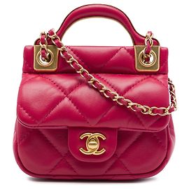 Portacarte Lady Chanel in vitello matelassé rosa con manico superiore e catena