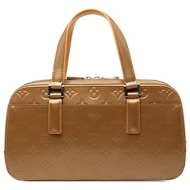 Louis Vuitton Gold Monogram Mat Shelton