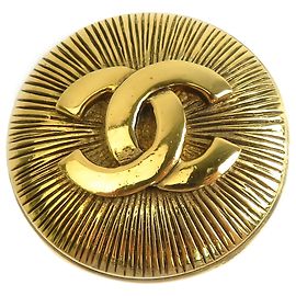 Broche ronde Chanel Gold CC plaquée or