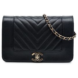 Cartera con cadena Mademoiselle Vintage Chanel en piel de oveja chevron negra