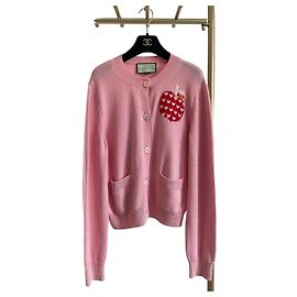Cárdigan Gucci de lana rosa con motivo de manzana