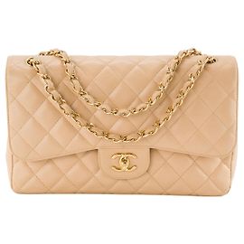 CHANEL - Classic/Timeless Jumbo Chanel Schultertasche aus beigem Kaviarleder