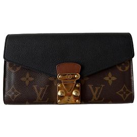 Portefeuille Louis Vuitton Pallas en toile Monogram et cuir noir