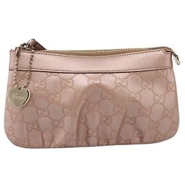 Pochette da polso Gucci Heart in pelle Guccissima