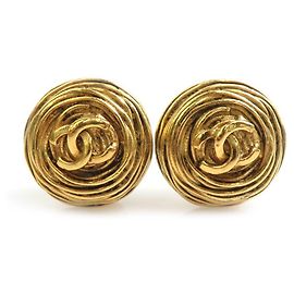 Boucles d'oreilles clips Chanel en métal doré