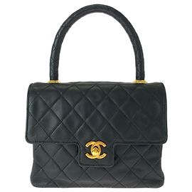 Bolsa Chanel Matelassé Coco Mark Turnlock