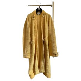 Cardigã longo de lã amarela Gucci com detalhe de laço