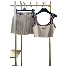 Chaleco de punto Miu Miu con logotipo a rayas beige algodón