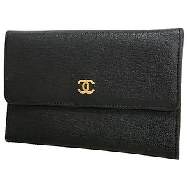 Portafoglio bi-fold Chanel in pelle nera