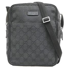 Bolso bandolera Gucci con bolsillo frontal en lona GG Small