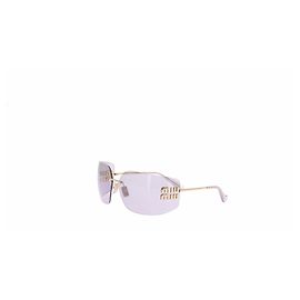 Gafas de sol Miu Miu doradas de metal