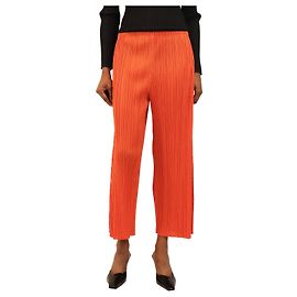 Pleats Please Orange pleated trousers - size UK 10