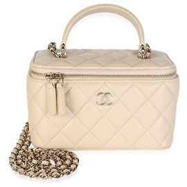 Piccola borsa vanity Chanel in pelle d'agnello matelassé beige con manico superiore e catena