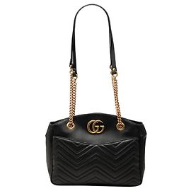 Borsa a tracolla con catena Gucci GG Marmont Matelassé in pelle di vitello nera, taglia Medium