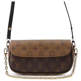 Portafoglio con catena Louis Vuitton Monogram Reverse