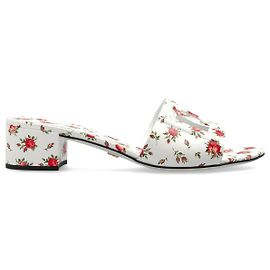 Mules Dolce & Gabbana in pelle bianca con motivo floreale