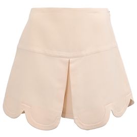 Minifalda festoneada Valentino Garavani en Crepe Couture de lana beige