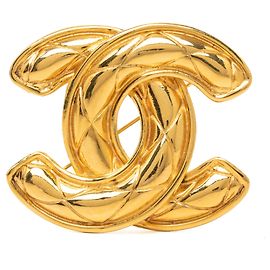 Broche acolchado Chanel CC chapado en oro