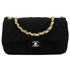 Bolso de hombro Chanel Medium Quilted Perforated Jersey Single Flap Negro