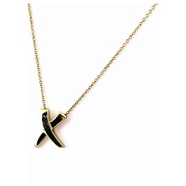 Autre Marque Colar com pingente Tiffany & Co. Kiss Cross em ouro amarelo