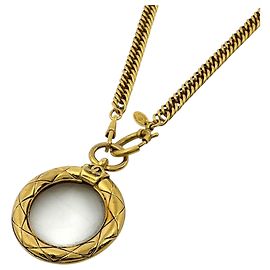 Collier Chanel plaqué or avec loupe Coco Mark