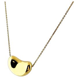 Autre Marque Collana con pendente Tiffany & Co. Bean in oro giallo