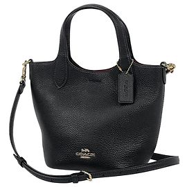 Bolso bucket Coach Hannah de cuero negro