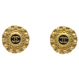 Orecchini a clip rotondi in resina placcata oro Chanel Gold CC