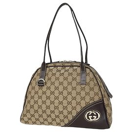 Borsa a tracolla Gucci in tela GG beige e marrone