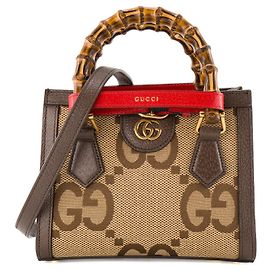 GUCCI - Bolsa de ombro Gucci Diana mini em tela monogramada e couro granulado castanho