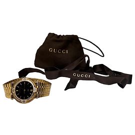 Orologio bracciale Vintage Gucci tono oro quadrante nero fine anni 1980
