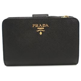 Portafoglio Prada bi-fold in pelle Saffiano nera