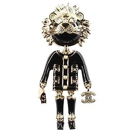 Chanel Spilla Coco Lion in metallo dorato e smalto nero