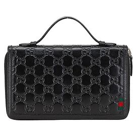 Portafoglio con zip rotondo Gucci Guccissima