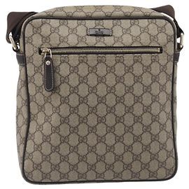 Borsa Messenger Gucci con zip frontale in tela rivestita GG Medium