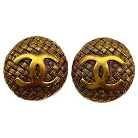 Pendientes de clip redondos trenzados Chanel CC chapados en oro
