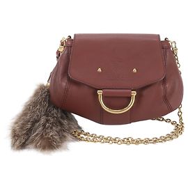 Borsa a tracolla Gucci in pelle con catena e charm in pelliccia Bamboo
