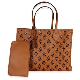 Borsa Tote Medium Gucci in pelle di vitello marrone con logo GG impresso e trafori a diamante