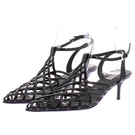 Alaïa Geflochtene Mules in Schwarz