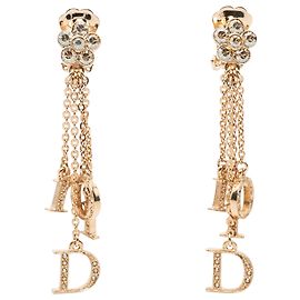 Orecchini a clip Dior Gold placcati in oro con ciondolo logo fiore strass