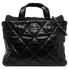 Bolso Tote Portobello Chanel de piel de becerro glaseada acolchada negra y tweed