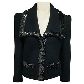 Giacca in tweed di lana bouclé nera con paillettes Dolce & Gabbana