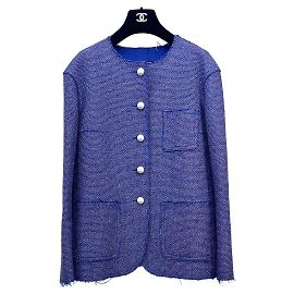Giacca Chanel in tweed viola