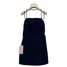 Vestido Miu Miu de terciopelo negro con cuello halter